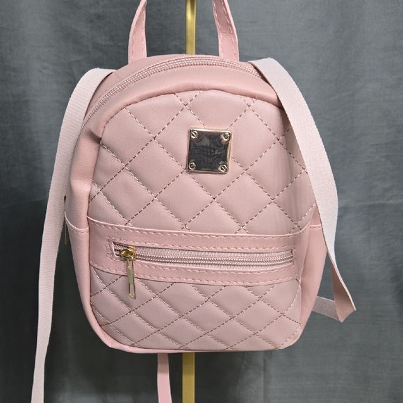 Handbags - Elegant Pink Quilted Backpack NWOT